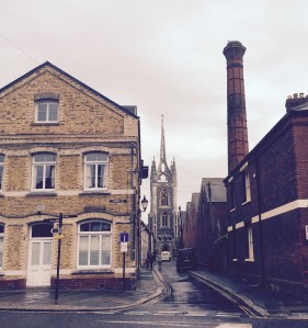 St Mary of Charity with brewery chimney in the foreground.